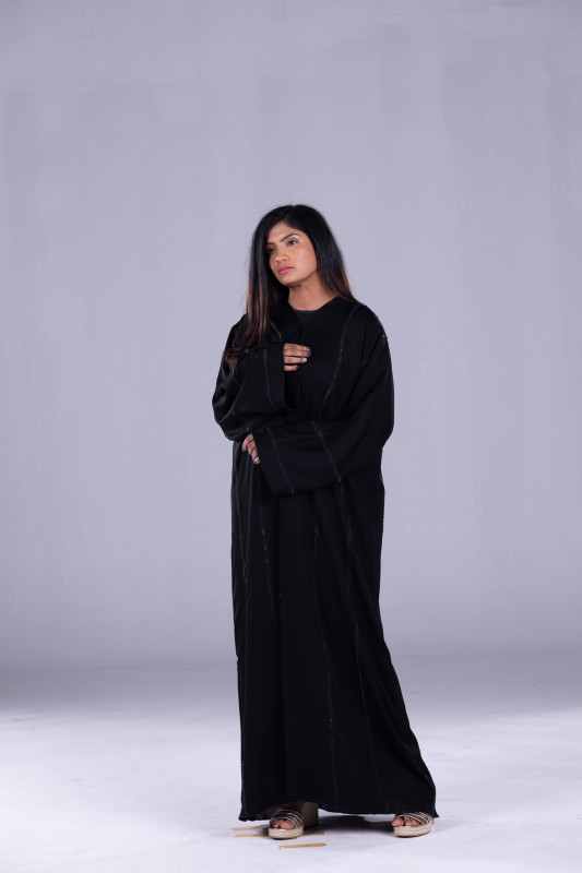 BLACK Abaya with BLACK lazer cutting and BLACK handmade beads around the Abaya. AB1038